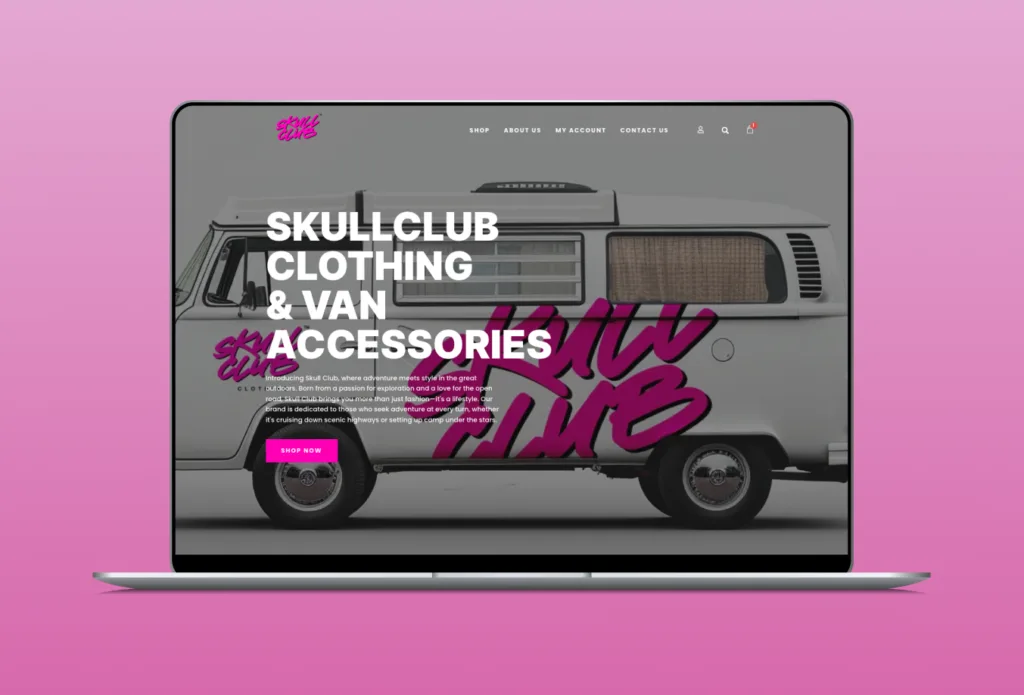 A screenshot of the skull club clothing website overlayed on a laptop with a pink background